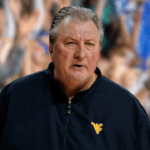 After being arrested for DUI, West Virginia men's basketball coach Bob Huggins quits and says he will retire.