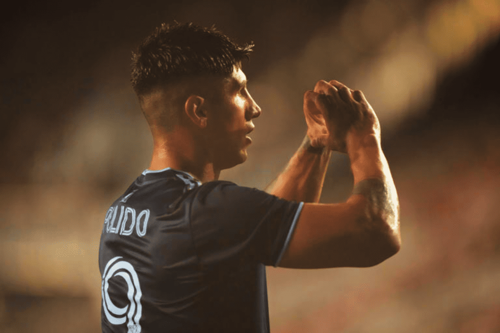 Alan Pulido, a forward for Sporting Kansas City, celebrates with fans after getting a goal during the second half of an MLS soccer game against Inter Miami on September 9, 2023, in Fort Lauderdale, Florida. 