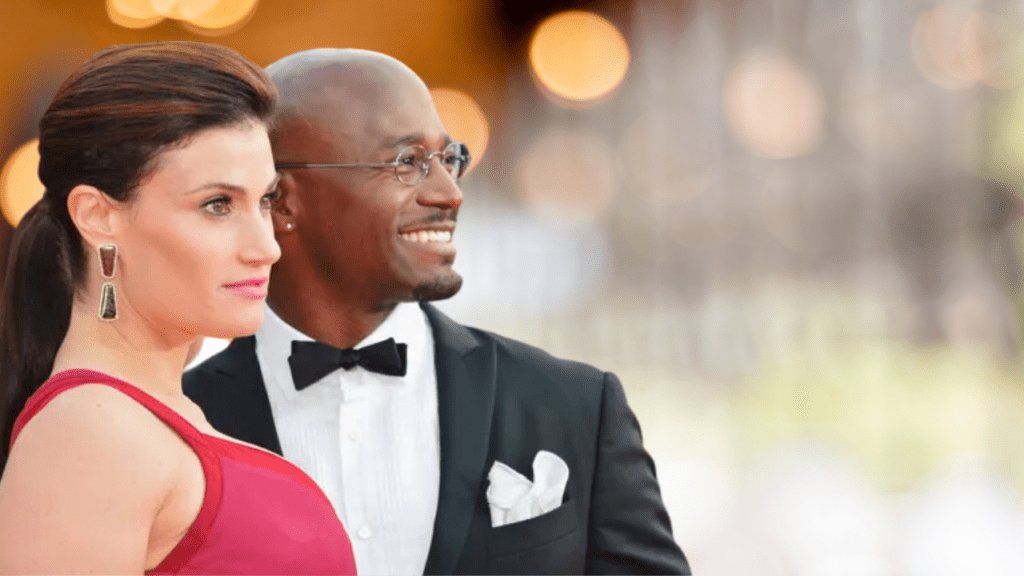 Idina Menzel talks about how the “interracial aspect” of her marriage to Taye Diggs caused them to split up.