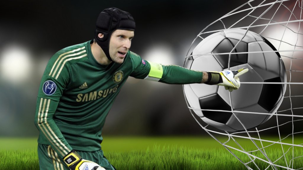 Petr Čech, former Chelsea goalkeeper, making a crucial save during a match.