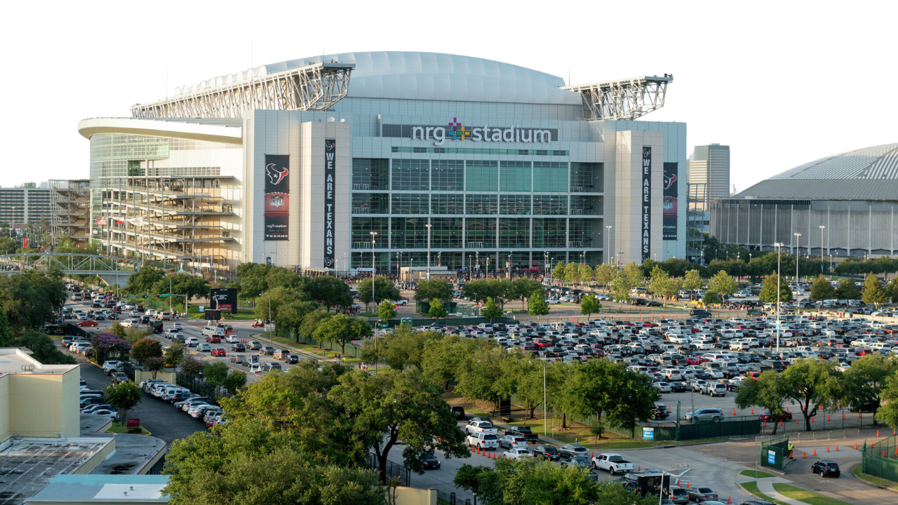 Exterior view of NRG Stadium, showcasing its modern architecture and retractable roof in Houston, Texas.