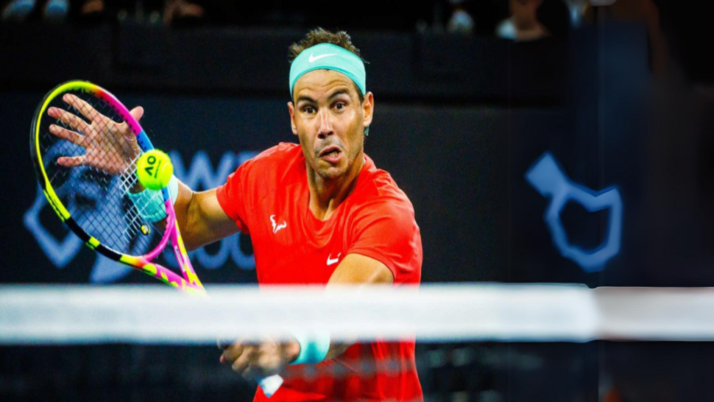 Rafael Nadal of Spain hits a return during his Brisbane International men's singles match against Jordan Thompson of Australia.
