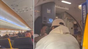 Rio Ferdinand on a Ryanair flight, reacting to Arsenal fans chanting Saka's name.