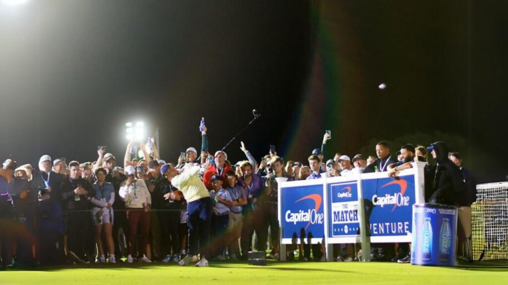 During The Match IX, Rory McIlroy hits a tee shot.