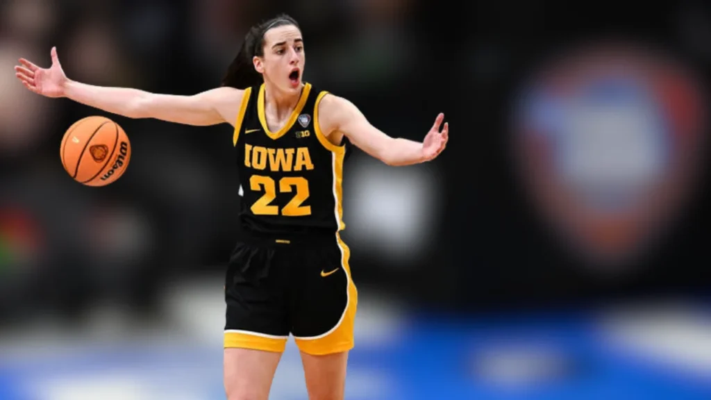 In the second half of the 2024 NCAA Women's Basketball Tournament championship game between Iowa and South Carolina at Rocket Mortgage FieldHouse in Cleveland, Ohio, on April 7, 2024, Iowa Hawkeyes #22 Caitlin Clark reacts to a play.