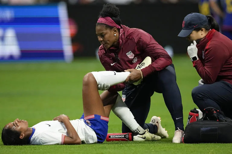 The SheBelieves Cup soccer tournament for women will take place in Atlanta on April 6, 2024. Naomi Girma (4) of the US is helped off the field after getting hurt against Japan in the first half.

