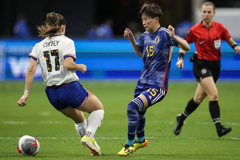 Sam Coffey (17) of the United States and Aoba Fujino (15) of Japan fight for the ball in the first half of the SheBelieves Cup women's soccer event in Atlanta on April 6, 2024.
