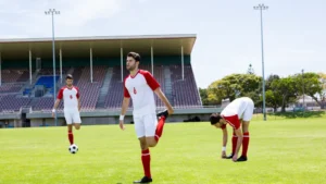 Learning how to play football Warming up