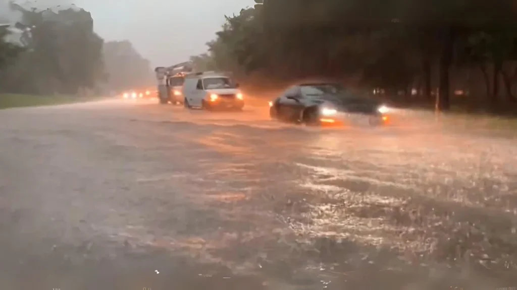 This picture, which comes from a video shared on social media, shows cars driving through floodwaters in the Houston, Texas, area on May 2, 2024.
@StormChasterHTX