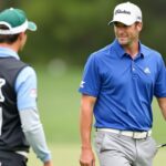 Scottie Scheffler with fill-in caddie Brad Payne at the FedEx St. Jude Championship final round.