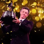 Rory McIlroy holding the BBC Sports Personality of the Year trophy while thanking his family