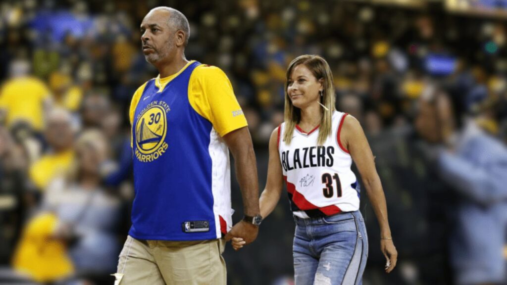 Dell Curry and his new spouse celebrating their wedding day, radiating joy and happiness.