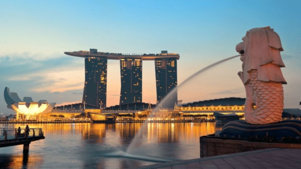 Stunning skyline of Singapore featuring Marina Bay Sands and the Gardens by the Bay.