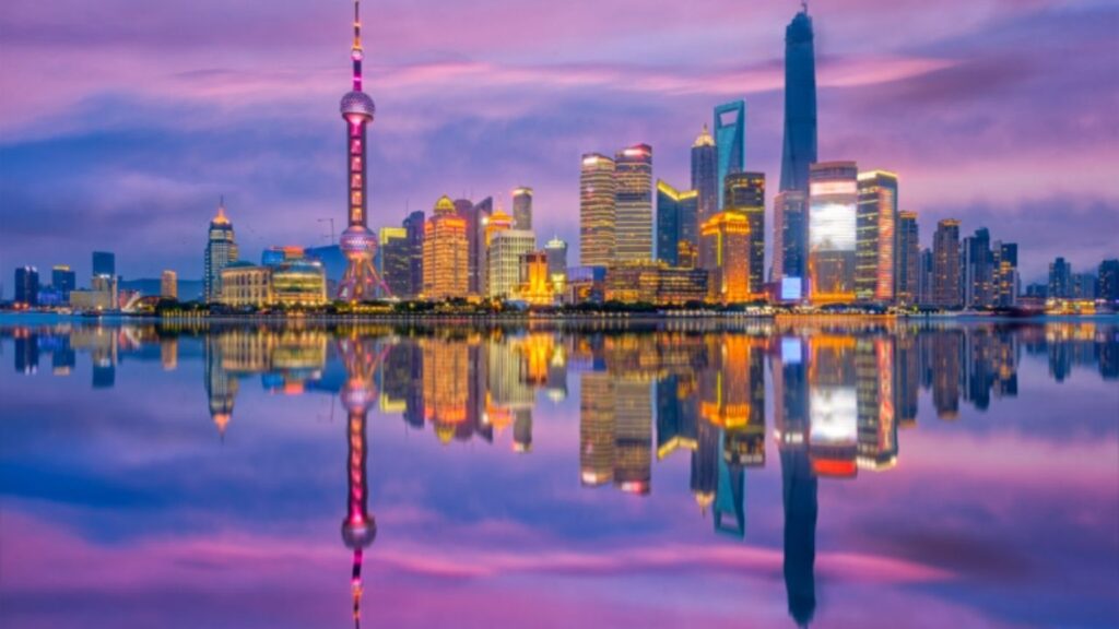 View of Shanghai's skyline featuring the Oriental Pearl Tower and modern skyscrapers.