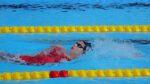 Summer McIntosh in mid-swim, breaking the 10-year-old world record in the 200-meter individual medley at the Canadian Swimming Trials