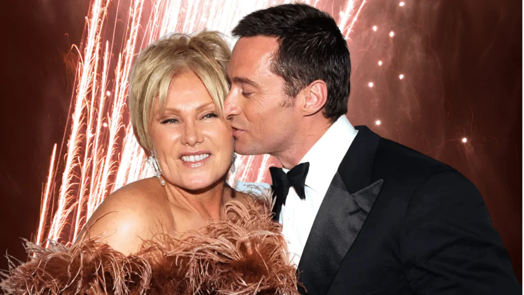 Hugh Jackman is surprised by Deborra-lee Furness when she comes out on stage at the Tony Awards on June 10, 2012