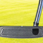 This putter is like cheating, says Rickie Fowler's caddie about where golf's hottest club got its start.